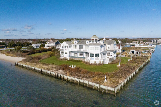 Custom-built homes boast waterfront views in Hampton bays.