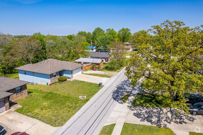 Ranch homes line a neighborhood street in Doling Park.