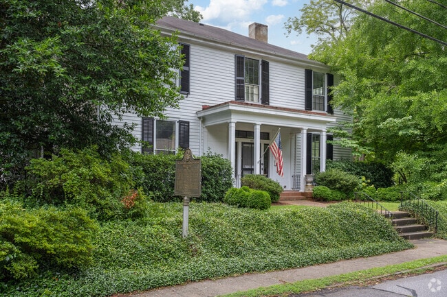 Historical colonial revivals are now residential homes in Cobbham.
