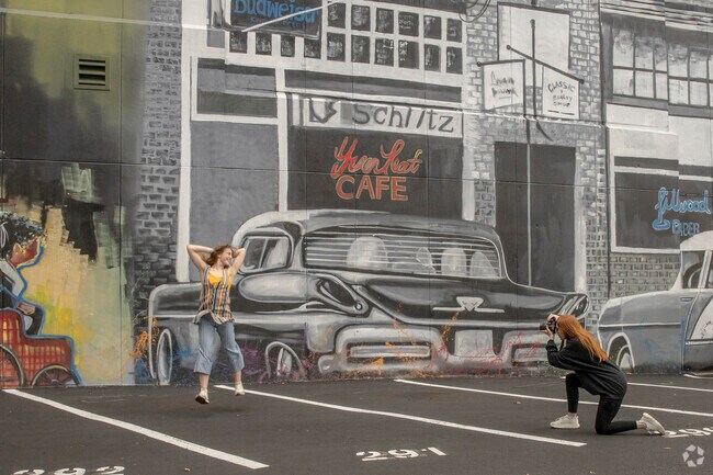 Murals on Main Street make a great backdrop for a photo shoot.