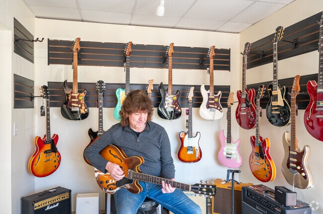 Learn to play guitar at the Middle Street School of Music in Plymouth Center.
