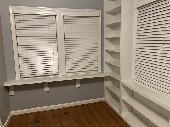 Bedroom with built in shelving, option for unfurnished or furnished