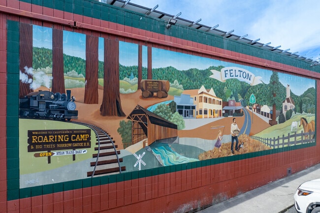 This vibrant mural in downtown Felton captures the spirit of the town with images of redwoods, Roaring Camp, Covered Bridge Park, and classic Highway 9 charm.