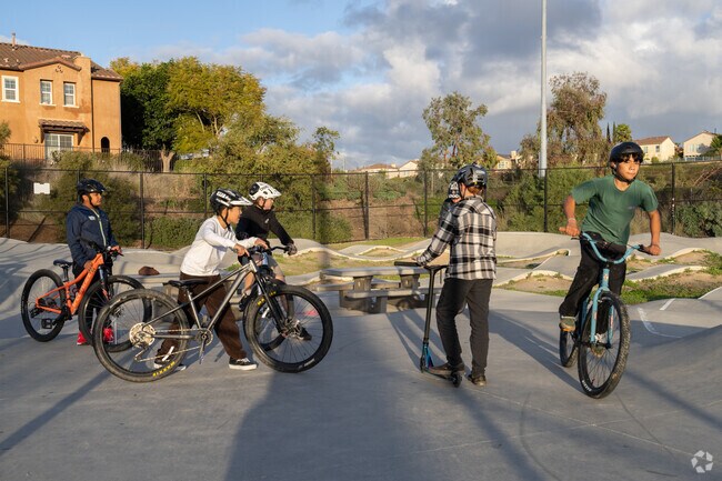 The kids are spending the day jumping their bikes in the park in Torrey Highlands