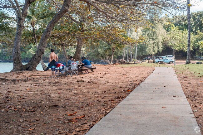 Community gatherings often involve music and dance, sharing the joy of Hawaiian traditions.