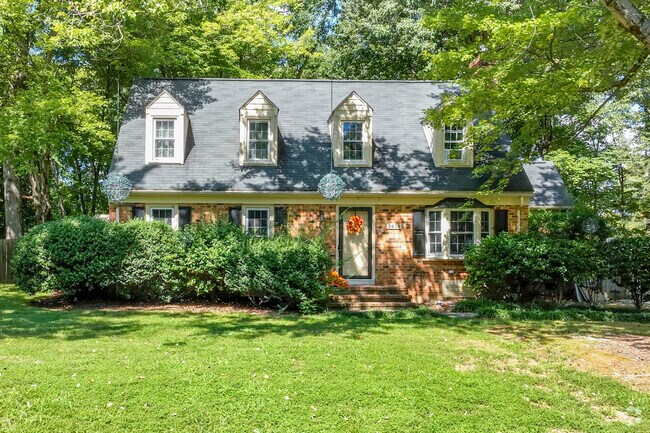 Battlefield streets and homes are surrounded by lush old growth foliage.