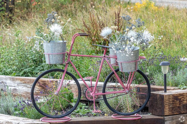 A welcoming neighborhood with tree-lined streets and beautiful homes awaits in Flanders Creek.