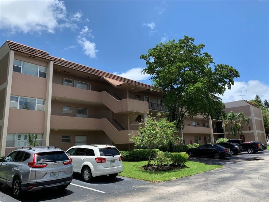 8350 Sands Point Blvd unit 104E, Tamarac, FL 33321 - photo 1