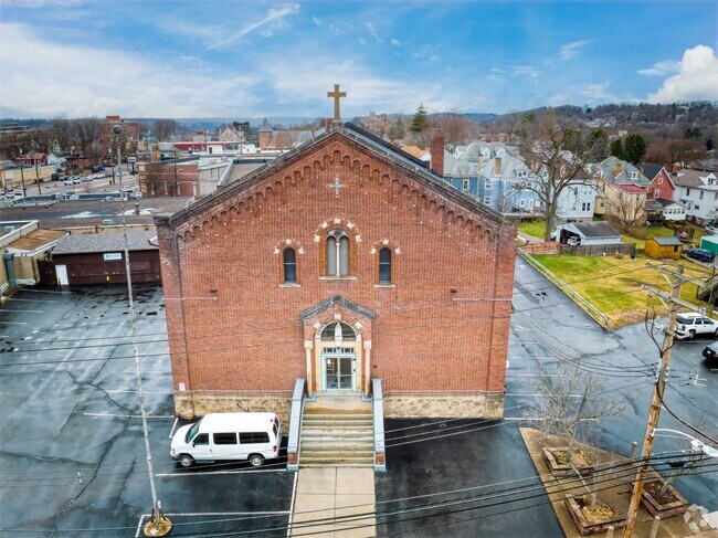 Assumption Elementary (now Saint Ambrose Academy) in Bellevue is a pillar of the community.
