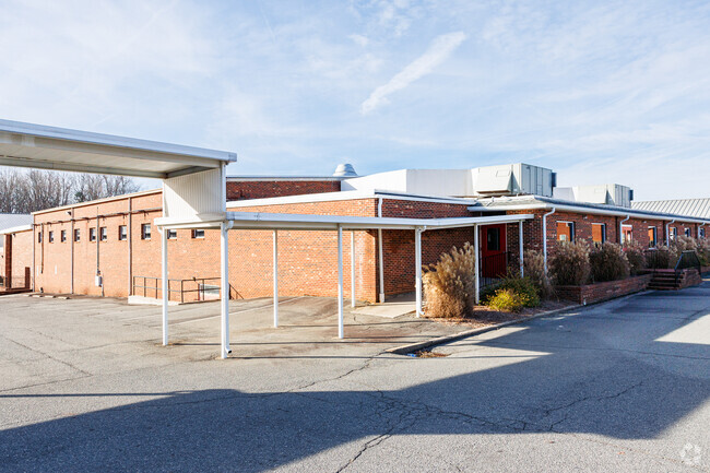 Gospel Light Christian Academy features a covered walkway for drop-offs and pickups.