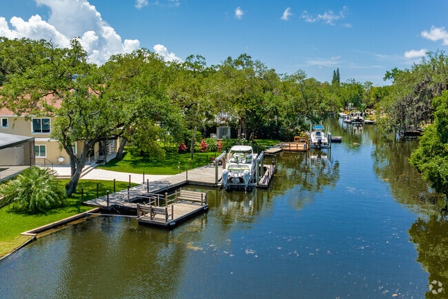 The Cotee River winds its way through Downtown New Port Richey and is lined with homes and boats
