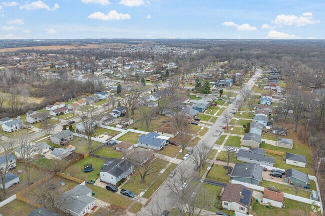 Mature oak trees line the gridded streets of Belmont.