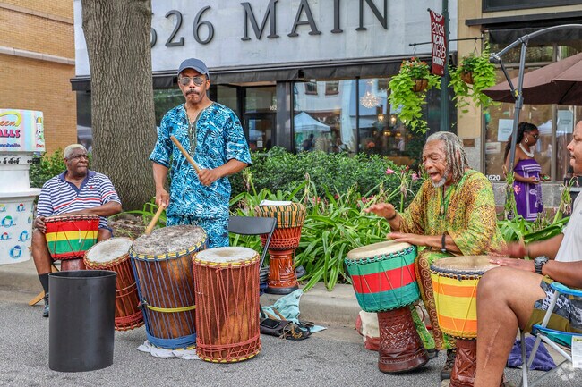 These talented drummers draw an audience at Soda City Market near West Columbia.