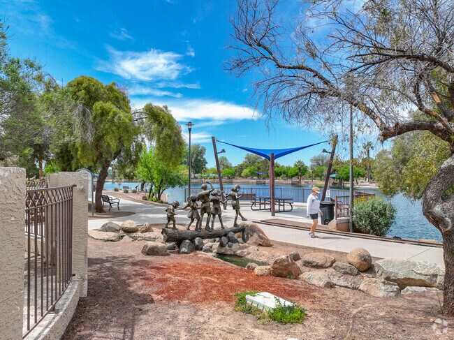 Desert Breeze Park has plenty of trees for shade, paved walking paths, and picnic ramadas around the pond.