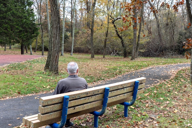 Sitting on a bench at Juliustown Park enjoying the warm day in Wrightstown.