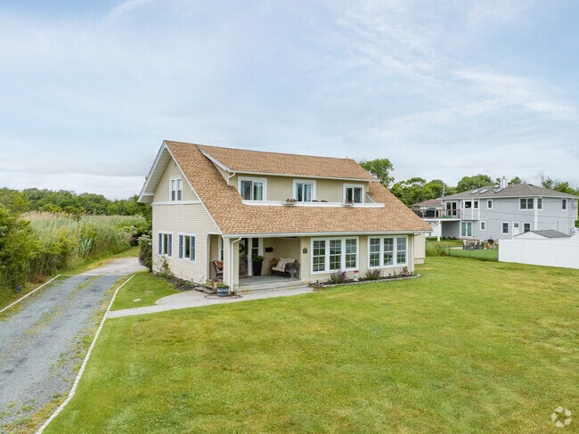 Spacious cape style home with plenty of yard space in Patchogue.
