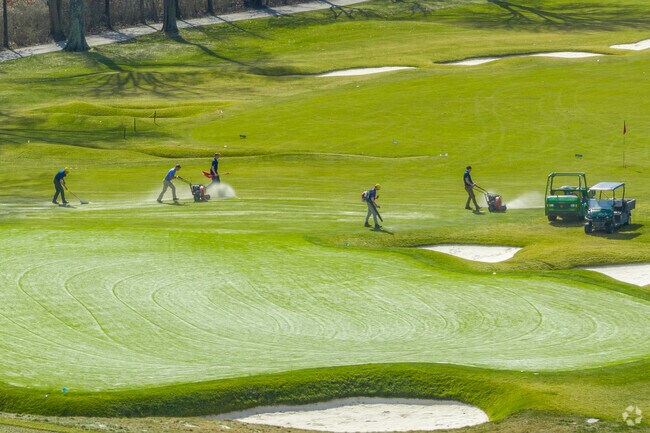 Workers prep the Oakmont Country Club near Plum, PA.
