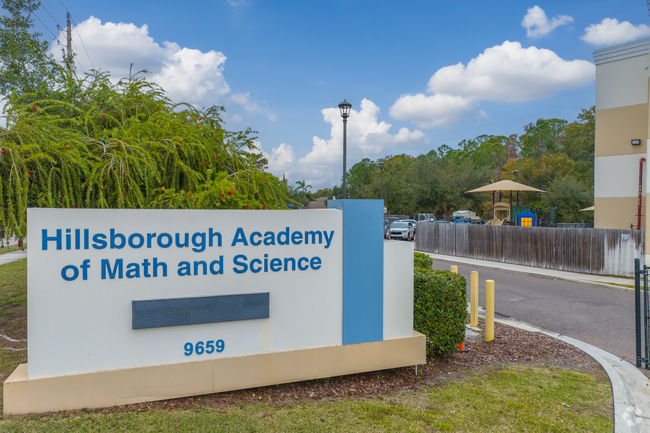 Hillsborough Academy of Math and Science signage directs student to the school.