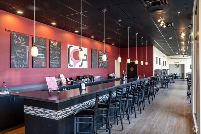 Michigan By The Bottle tasting room, offering Michigan made bottles of wine in the City of Auburn Hills.