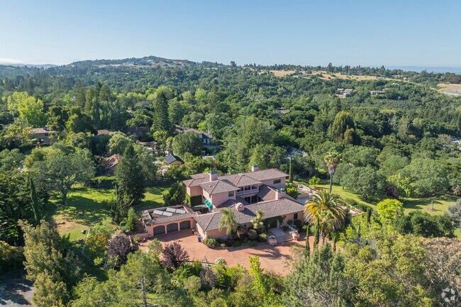 Woodside has some massive Spanish architectural style houses.