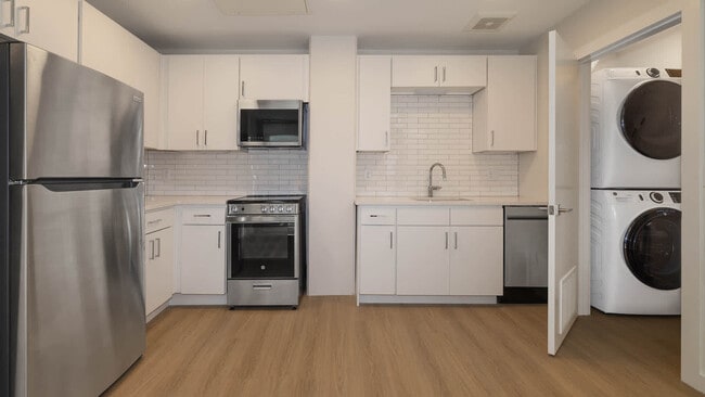 Kitchen with In-home Washer and Dryer