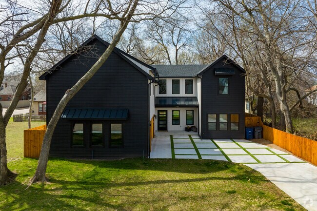 Sunrise Terrace has modern two-story homes with driveways in Tulsa, OK.