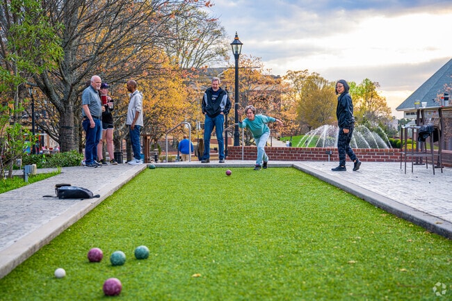 Local residents of Wellington enjoy a brief yet scenic drive to the vibrant city of Duluth, where they indulge in a lively night out filled with delightful dining, entertainment, and socializing under the twinkling lights.