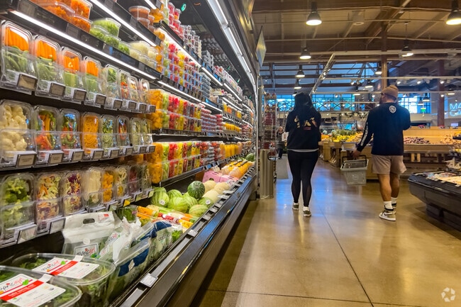 Residents browse the fruits and vegetable section at Metropolitan Market.
