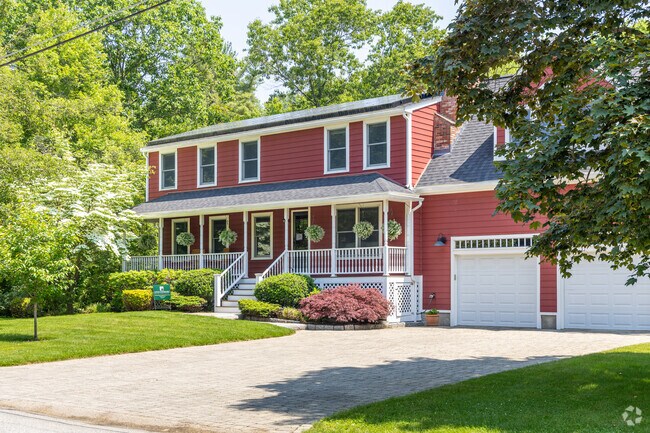 A colorful, large farmhouse styled home in the Littleton Road neighborhood of Chelmsford, MA.