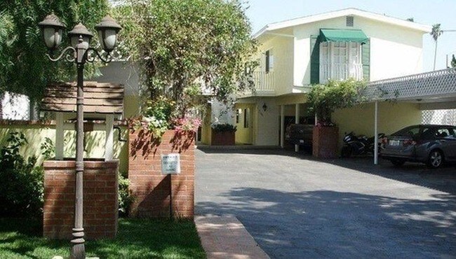 Front of Apartment and Parking Lots