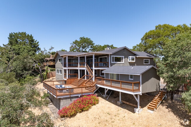 A new multi-level home enjoys a vast view of Green Point.