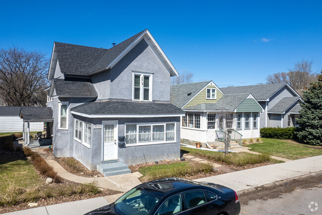 Large two-story stucco home in the Marshall Terrace neighborhood.