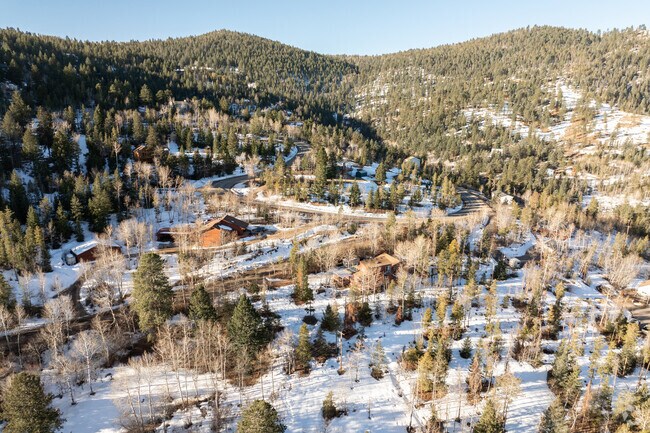 There are several homes amongst the hills of Hilldale Pines.