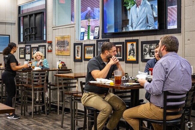 Grazierville locals enjoy their lunch with company at The Bull Pen Restaurant & Sports Bar.
