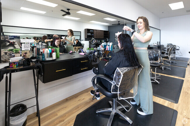 Treat yourself at the Lotus Salon, they are just south of the Spring Creek neighborhood.