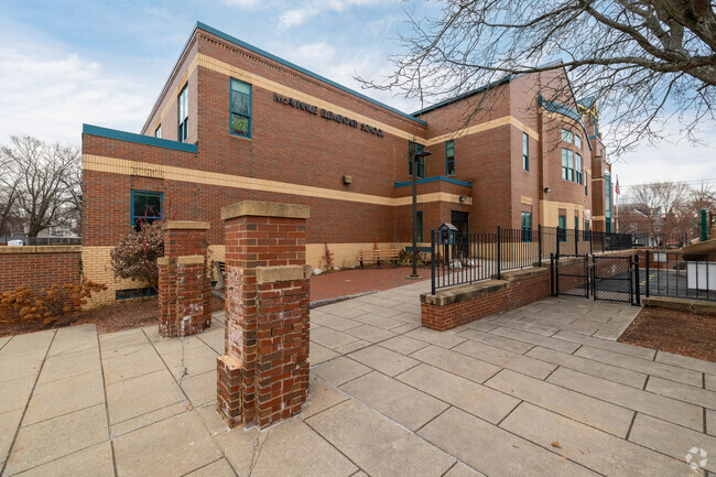Joseph McAvinnue Elementary School has a fenced play area to keep students safe.