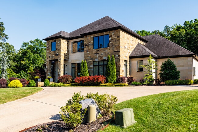 Large custom homes in Woodlands Edge vary in style and finish.