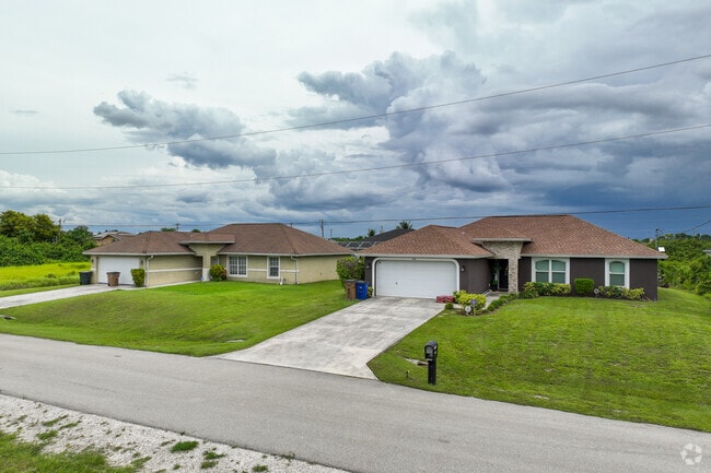 Traditional family homes lining up on the spacious streets of Sunshine neighborhood.