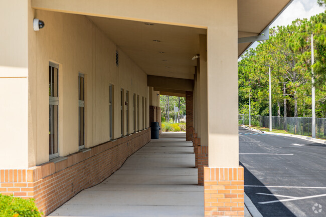 The Phoenix Program in Immokalee has a covered walkway and waiting area.