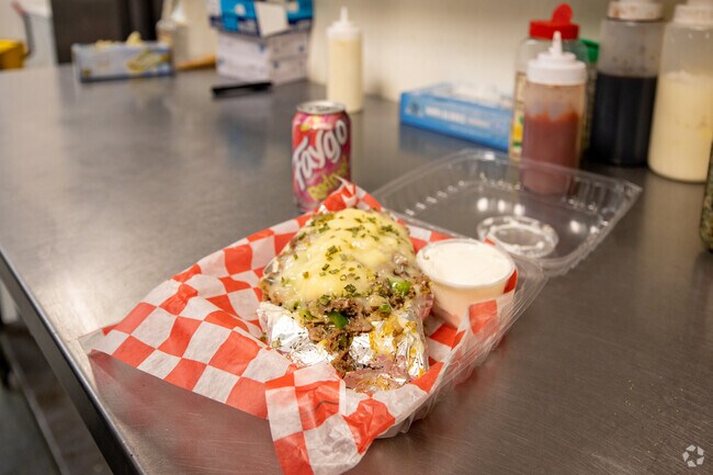 Grab a philly cheese steak stuffed potato at The Sleepy Potato in Oakman Boulevard Community.