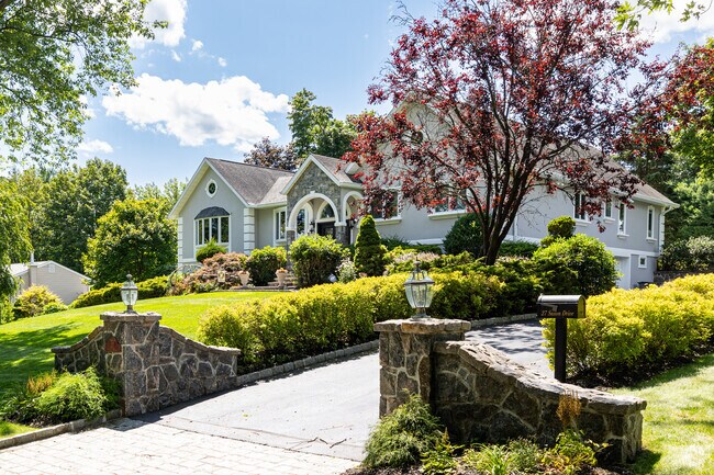 Lush greenery and mature trees frame Thornwood’s scenic streets and homes.