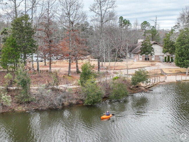 Despite the cold weather, a kayaker enjoys the lake at Colonel Francis J. Beatty Park.