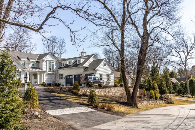 Other home options in Wellesley Farms include colonial revivals with attached garages.