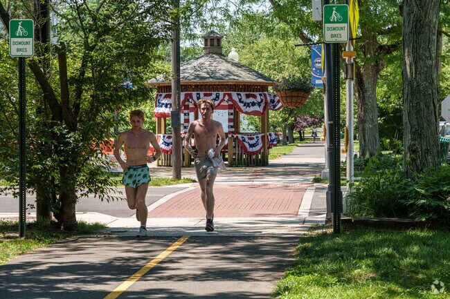 The warm weather brings out runners to the Merchantville Mile for a workout.
