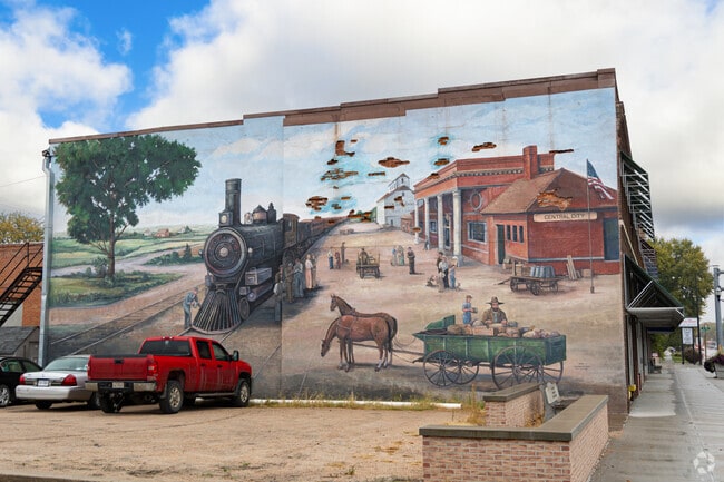 A vibrant mural in Central City celebrates the town’s rich agricultural heritage and community spirit.