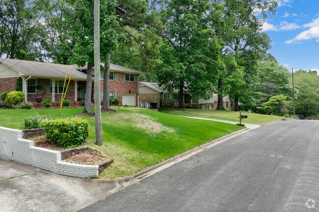 Huffman neighborhood has homes with lots of mature trees.