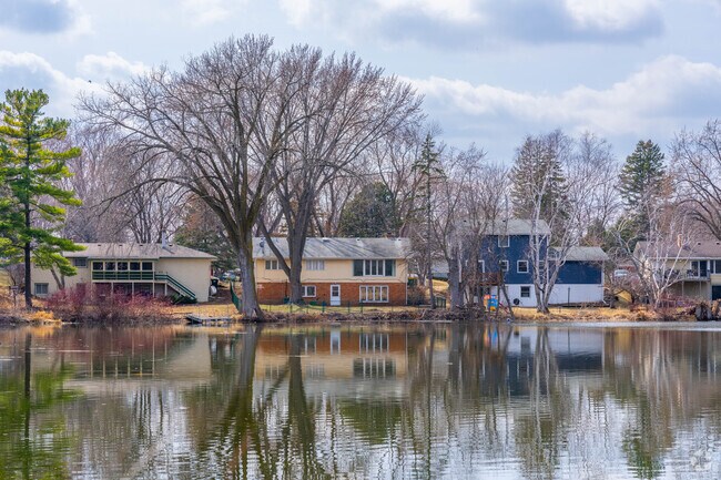 Homes line the shores of Meadow Lake in the neighborhood.