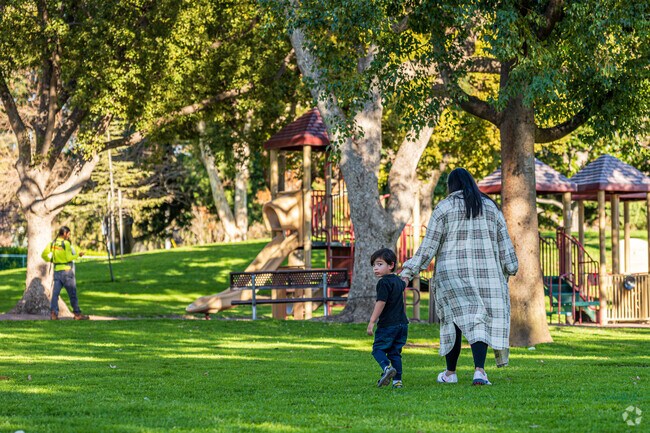 Mom and Son walking to the playground for toddlers at Michigan Park in Whittier.