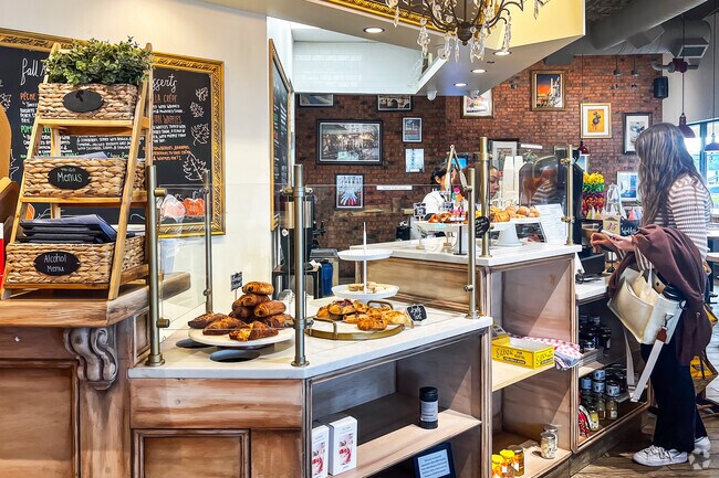 Indulge in delightful moments at Le Petit Paris Cafe, unfolding French-inspired delights.