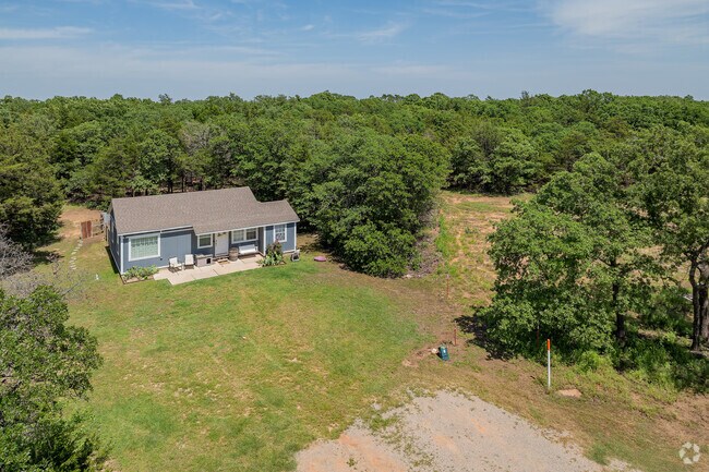 Affordable houses in Tryon come with spacious yards and mature trees.